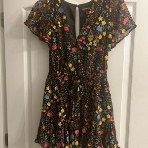 Sugarlips Black Floral Wrap Romper with Orange and Blue Blooms